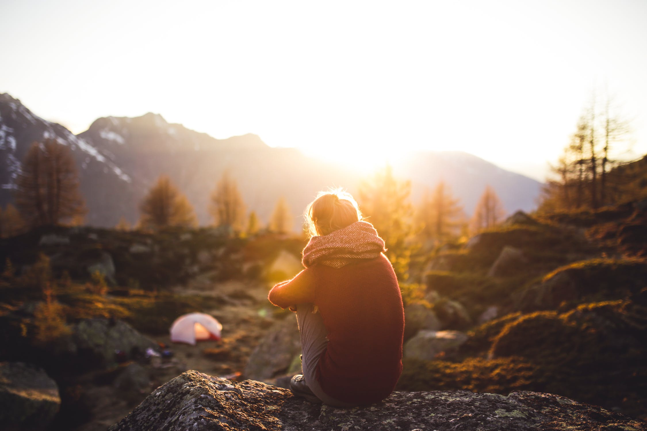 woman looking at mountains
